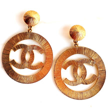 Load image into Gallery viewer, CHANEL MASSIVE ICONIC SUN BURST LOGO HOOP EARRINGS 1992
