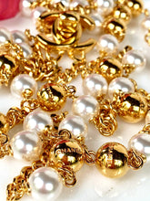 Load image into Gallery viewer, CHANEL UNIQUE TURNLOCK SET OF 2 SAUTOIR NECKLACES WITH PEARLS AND LOGOS