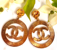 Load image into Gallery viewer, CHANEL MASSIVE ICONIC SUN BURST LOGO CELEBRITY HOOP EARRINGS 1992