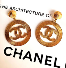 Load image into Gallery viewer, CHANEL MASSIVE ICONIC SUN BURST LOGO HOOP EARRINGS 1992