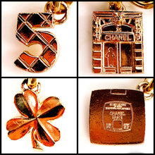 Load image into Gallery viewer, CHANEL 31 ELABORATE AMULET MEDALLION CHARM GRIPOIX NECKLACE BELT NEW WITH TAGS