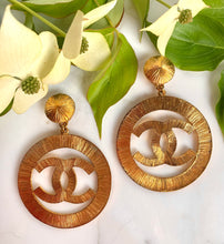 Load image into Gallery viewer, CHANEL MASSIVE ICONIC SUN BURST LOGO CELEBRITY HOOP EARRINGS 1992