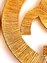 Load image into Gallery viewer, CHANEL MASSIVE ICONIC SUN BURST LOGO HOOP EARRINGS 1992