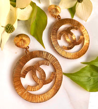 Load image into Gallery viewer, CHANEL MASSIVE ICONIC SUN BURST LOGO CELEBRITY HOOP EARRINGS 1992
