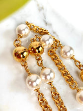 Load image into Gallery viewer, CHANEL UNIQUE TURNLOCK SET OF 2 SAUTOIR NECKLACES WITH PEARLS AND LOGOS