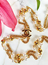 Load image into Gallery viewer, CHANEL UNIQUE TURNLOCK SET OF 2 SAUTOIR NECKLACES WITH PEARLS AND LOGOS
