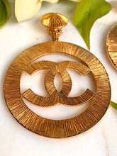 Load image into Gallery viewer, CHANEL MASSIVE ICONIC SUN BURST LOGO CELEBRITY HOOP EARRINGS 1992