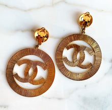Load image into Gallery viewer, CHANEL MASSIVE ICONIC SUN BURST LOGO HOOP EARRINGS 1992