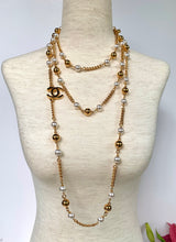 Load image into Gallery viewer, CHANEL UNIQUE TURNLOCK SET OF 2 SAUTOIR NECKLACES WITH PEARLS AND LOGOS