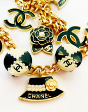 Load image into Gallery viewer, CHANEL BLACK AND WHITE CHARMING CHECKERBOARD PEARL CLIP ON EARRINGS 02