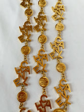 Load image into Gallery viewer, CHANEL 3 STRAND CHANEL LETTERS LOGO NECKLACE 18 CHANEL CLUSTERS AND 18 LOGO MEDALLIONS