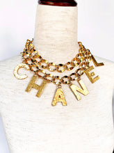 Load image into Gallery viewer, CHANEL C-H-A-N-E-L CHARMS GILT CHAIN BELT