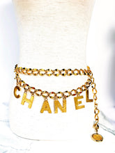 Load image into Gallery viewer, CHANEL C-H-A-N-E-L CHARMS GILT CHAIN BELT