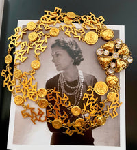 Load image into Gallery viewer, CHANEL 3 STRAND CHANEL LETTERS LOGO NECKLACE 18 CHANEL CLUSTERS AND 18 LOGO MEDALLIONS