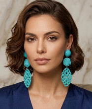Load image into Gallery viewer, FRANCINE BRAMLI TURQUOISE TRELLIS FLOWER RESIN CLIP ON EARRINGS
