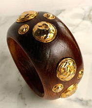 Load image into Gallery viewer, CHANEL RARE VINTAGE WOOD 1990 HIGHLY COLLECTABLE BANGLE BRACELET WITH GILT HAMMERED MEDALLIONS
