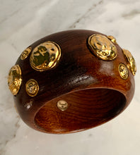 Load image into Gallery viewer, CHANEL RARE VINTAGE WOOD 1990 HIGHLY COLLECTABLE BANGLE BRACELET WITH GILT HAMMERED MEDALLIONS
