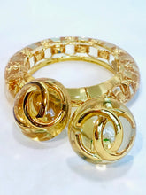 Load image into Gallery viewer, CHANEL LUCITE GOLD CC LOGO EARRINGS AND BANGLE SET DEMI PARURE
