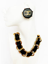 Load image into Gallery viewer, CHANEL HUGE LEATHER GOLD STUDDED RARE LOGO EARRINGS

