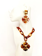 Load image into Gallery viewer, CHANEL TORTOISE GILT LOGO QUATREFOIL CLOVER SHEILD NECKLACE AND EARRING SET 1994
